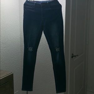 Dark washed ripped jeans